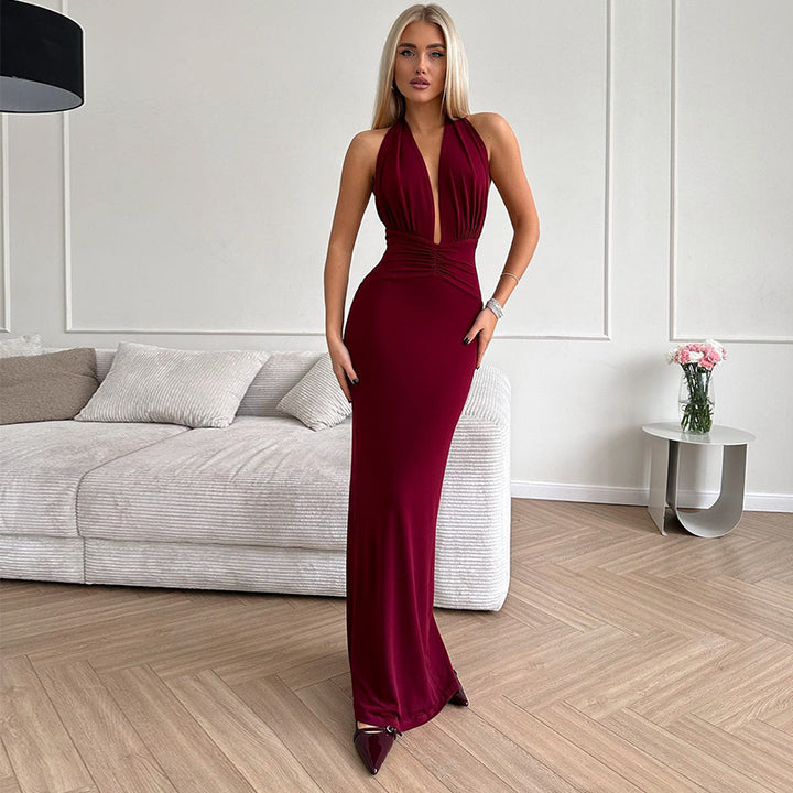Damer elegant kvällsklänning med djup V-ringning och figurnära silhuett Eva Jonsson