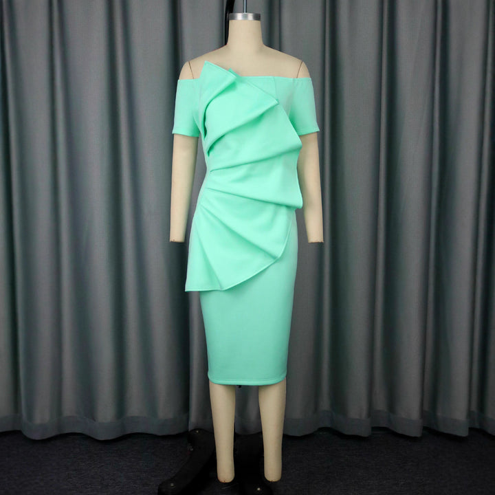 Damer Eleganta Cocktailklänning med asymmetrisk draperingsdesign Mirla-Eva Jonsson