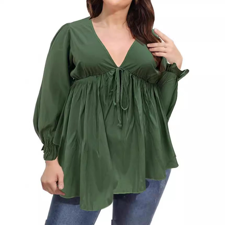 Damer blus med eleganta ruffle-detaljer och modeprint Eva Jonsson