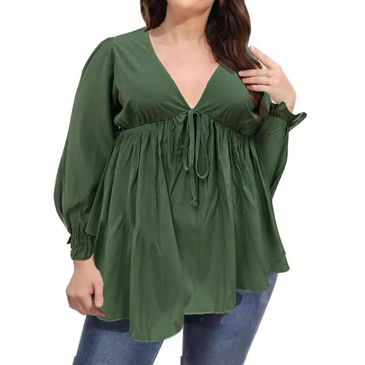 Damer blus med eleganta ruffle-detaljer och modeprint Eva Jonsson