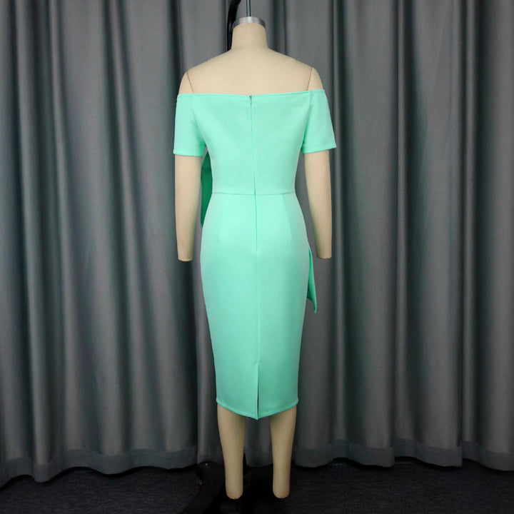 Damer Eleganta Cocktailklänning med asymmetrisk draperingsdesign Mirla-Eva Jonsson