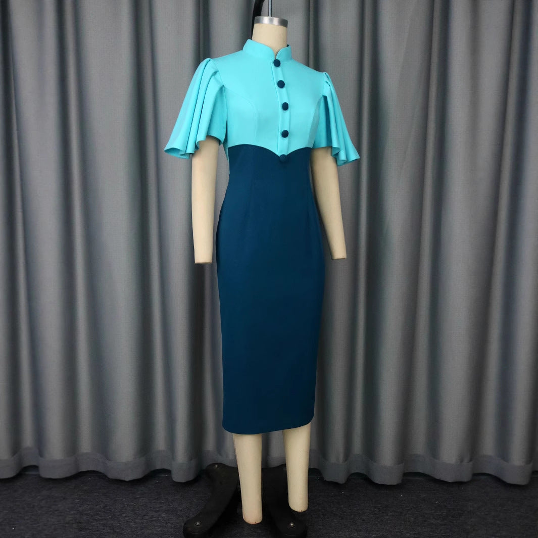 Damer figurnära klänning med elegant ståkrage och konstfulla puffärmar Mirla-Eva Jonsson