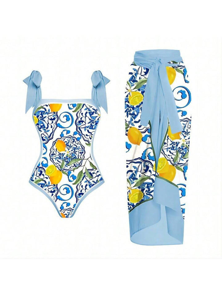 Damen Eleganter Badesuit mit floralen Akzenten und modischem Wickelrock Echo Archiv