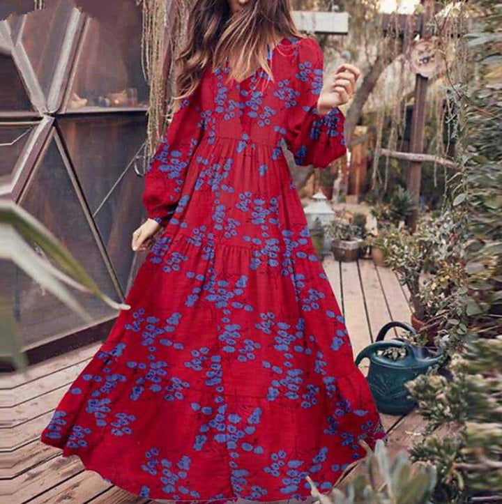 Damer Boho-långärmad klänning med blommiga accenter och svängande nederkant Eva Jonsson