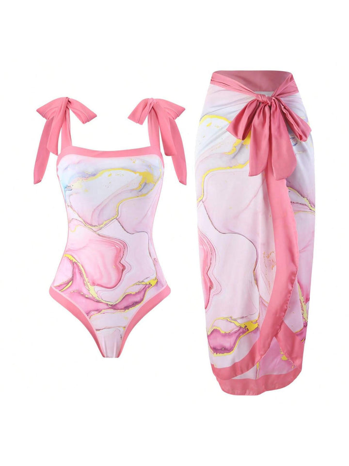Damen Eleganter Badesuit mit floralen Akzenten und modischem Wickelrock Echo Archiv