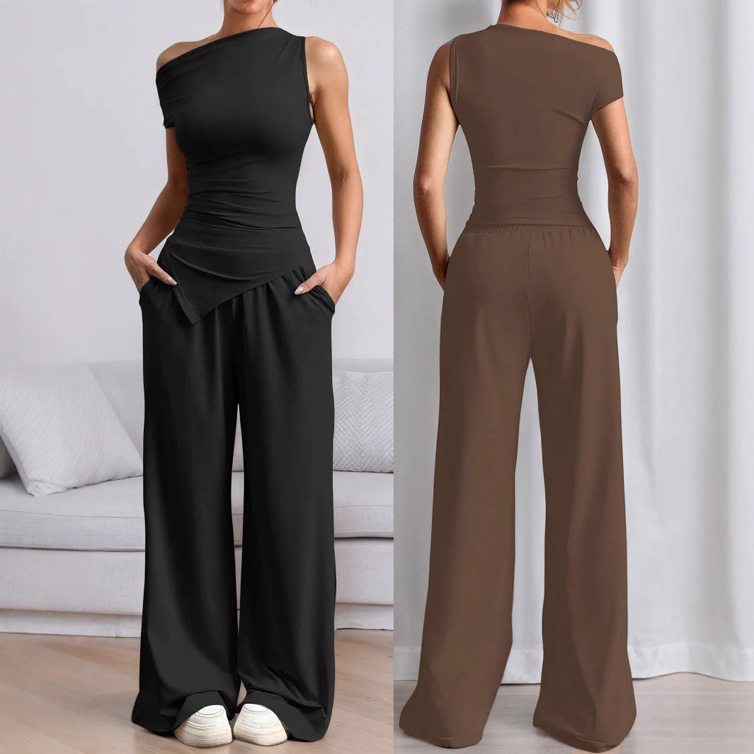 Stilig kvinnors jumpsuit med asymmetrisk design och fickor Mirla-Eva Jonsson