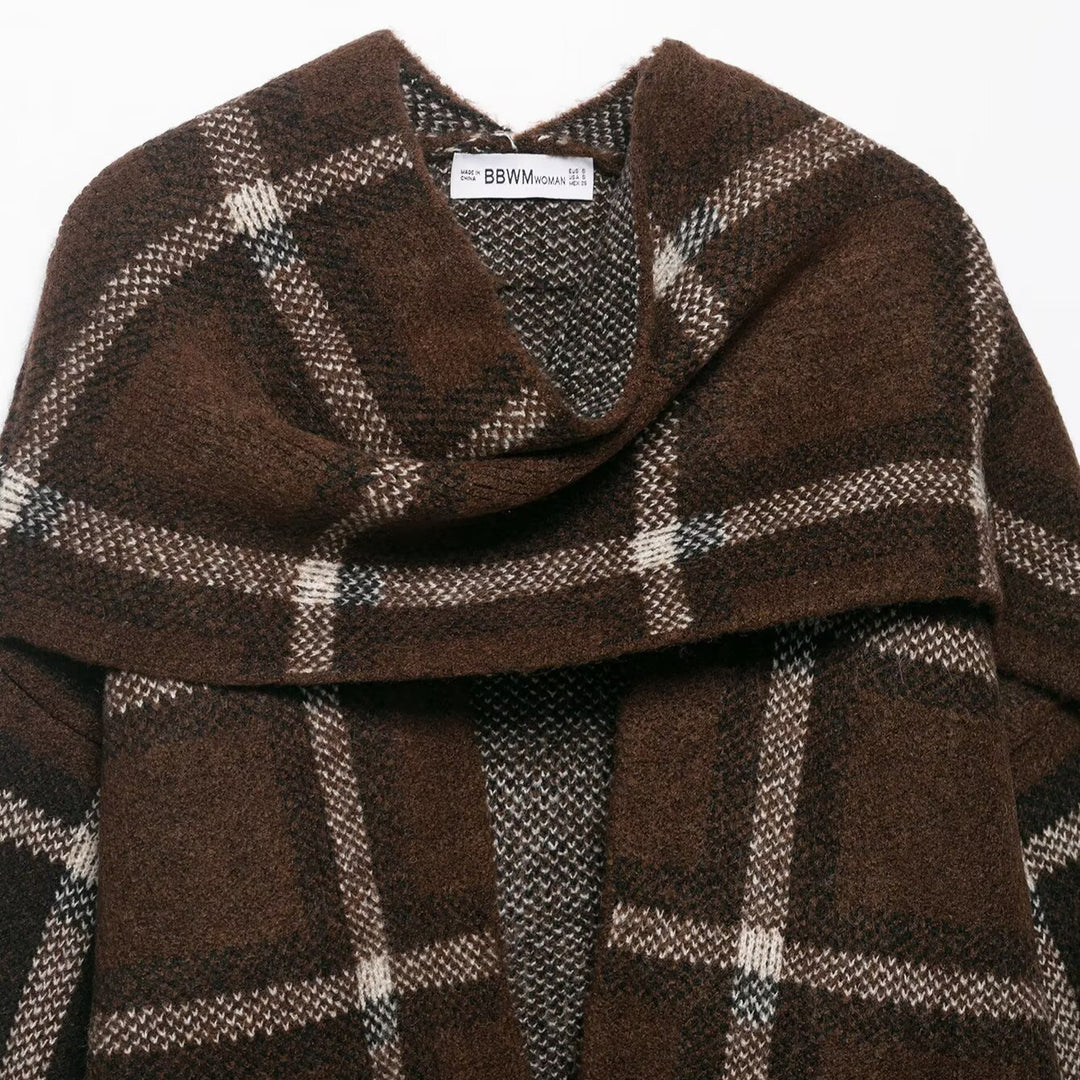 Tjejers eleganta oversized cardigan med rutmönster och praktiska fickor Mirla-Eva Jonsson
