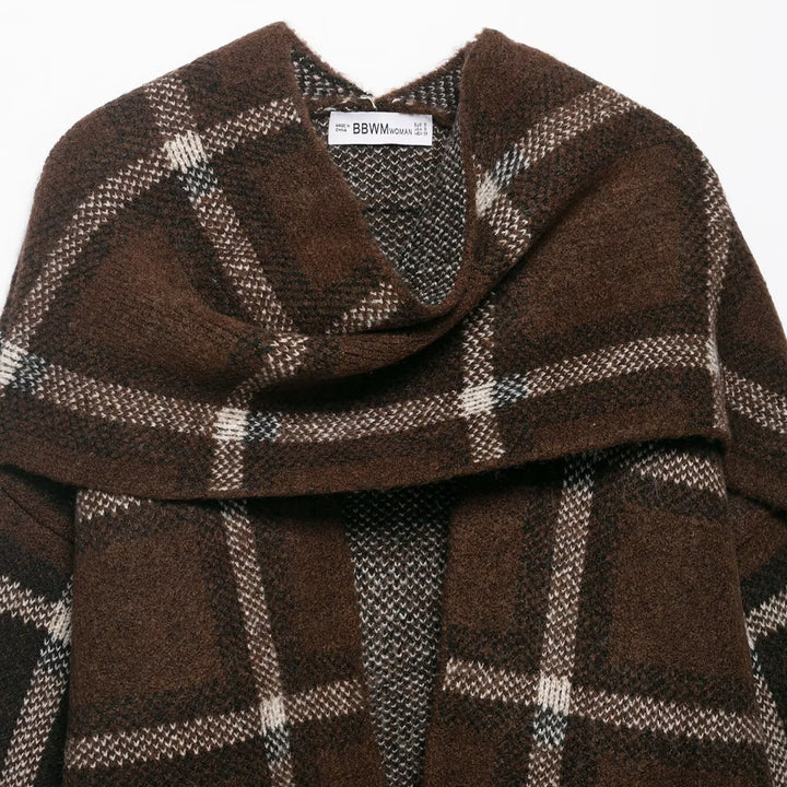 Tjejers eleganta oversized cardigan med rutmönster och praktiska fickor Mirla-Eva Jonsson