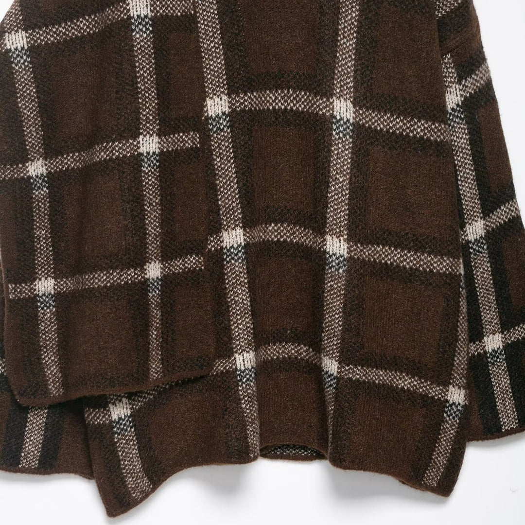 Tjejers eleganta oversized cardigan med rutmönster och praktiska fickor Mirla-Eva Jonsson