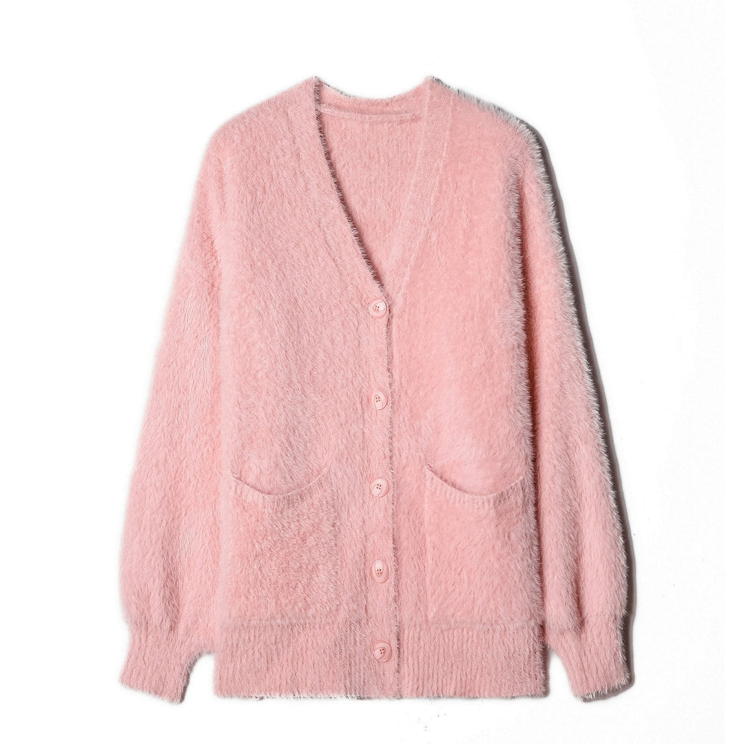 Tjejers fluffiga cardigan med fickor och breda slag Mirla-Eva Jonsson