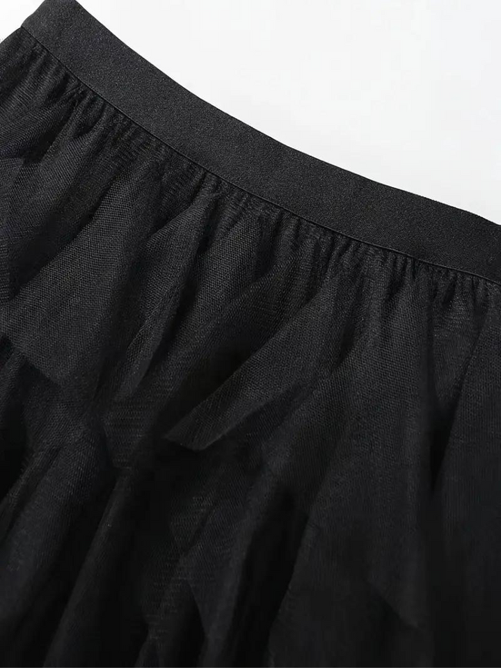 Tullkjol – Damkjol med hög midja och asymmetrisk volang-Eva Jonsson
