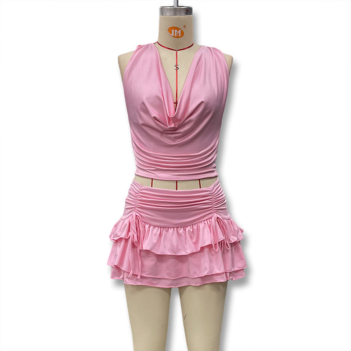Women Fresh and elegant wrap top with asymmetrical cut and playful ruffle edge Mirla-Eva Jonsson