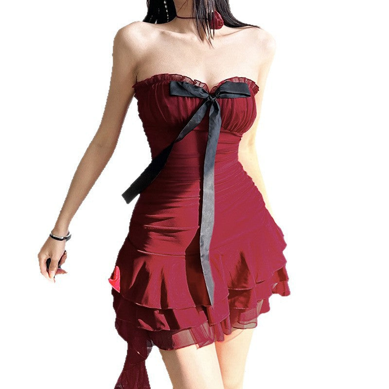 Women elegant wrap dress with voluminous ruffle details and waist belt Mirla-Eva Jonsson