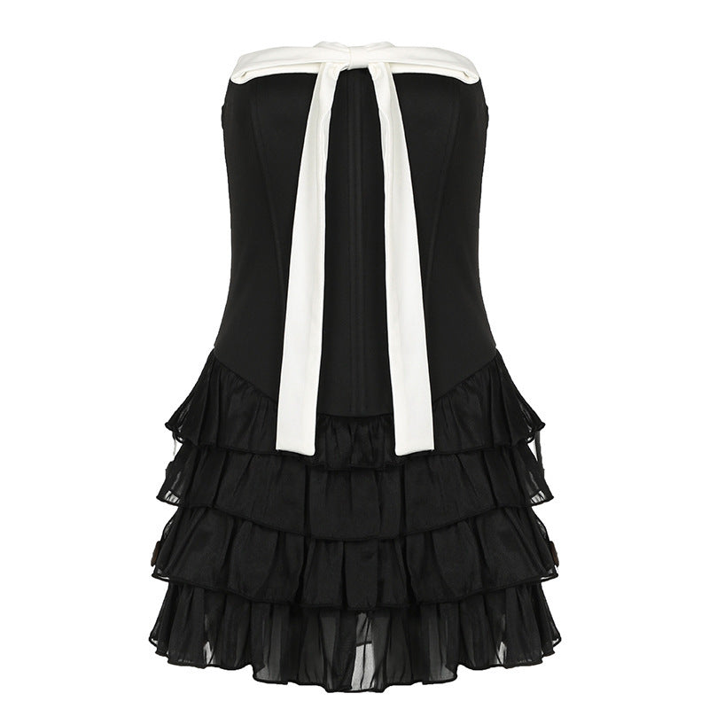 Women elegant wrap dress with voluminous ruffle details and waist belt Mirla-Eva Jonsson