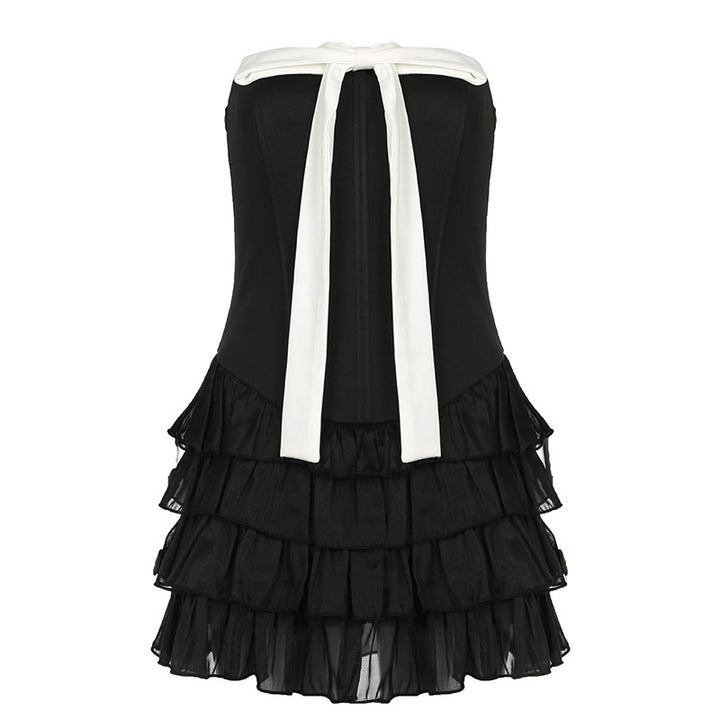 Women elegant wrap dress with voluminous ruffle details and waist belt Mirla-Eva Jonsson