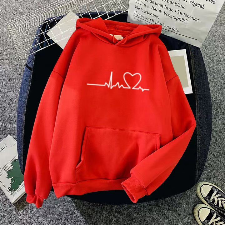 kvinnors hoodie med hjärtslag design Mirla-Eva Jonsson